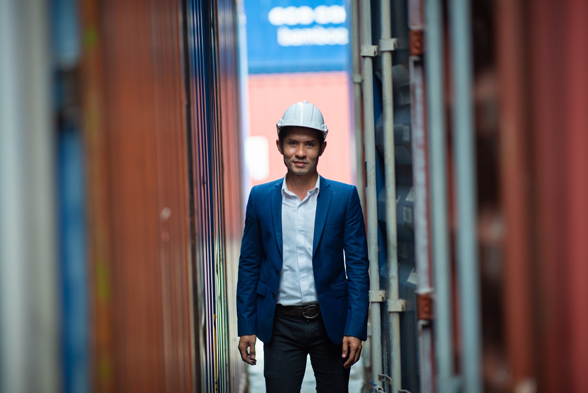 portrait-of-foreman-worker-standing-at-container-cargo-harbor-to-loading-containers.jpg